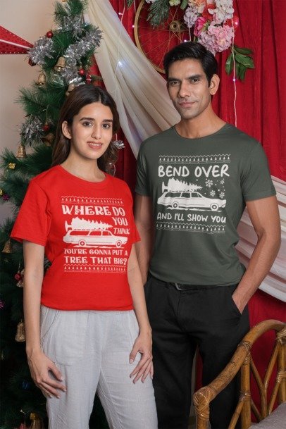 Gildan T-Mockup Featuring a Man and a Woman Posing Against a Christmas Tree m30611